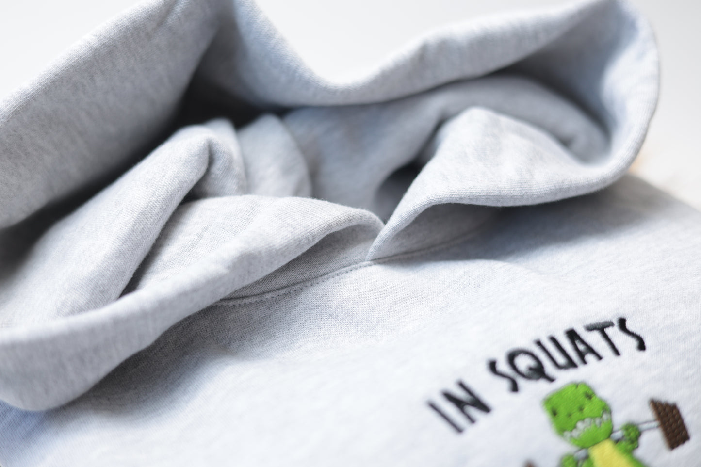 T-Rex In Squats We Trust Crewneck and Hoodie
